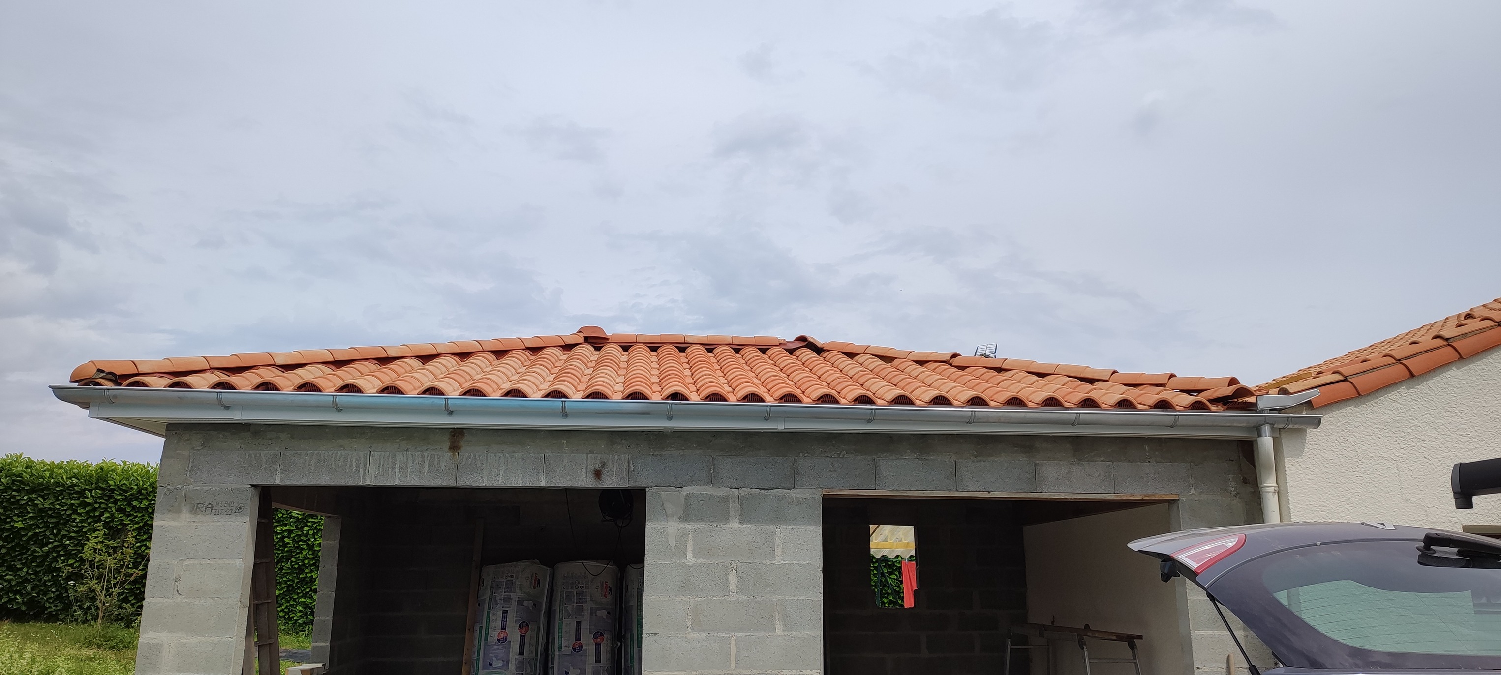Installation d’une gouttière demi-ronde sur extension